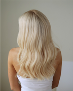 Back view of Pearle blonde wig showing pale pearl-toned lengths