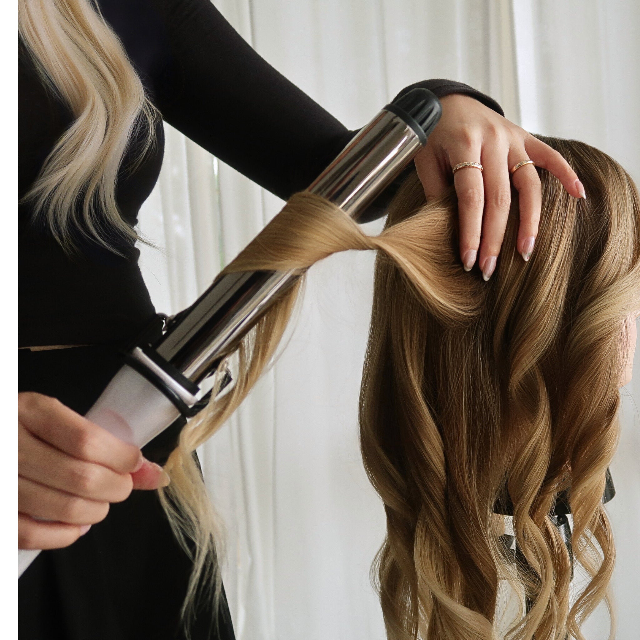 Restored Madeline Aken human hair wig after professional care, showing healthy shine, smooth texture, and refreshed shape.