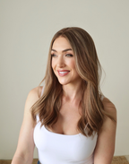 Side view of Amber 18-inch brown Remy human hair wig, featuring warm brunette tones, subtle highlights, and natural hair movement.