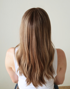 Back view of Amber 18-inch brunette human hair wig, showing layered toasted almond brown tones and softly blended highlights.