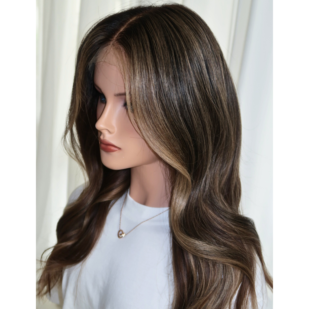 Close-up of glueless lace front on dark caramel highlight brunette human hair wig, 20 inch