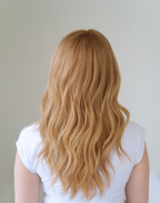 Back view of Apricot ginger blonde wig showing soft apricot and golden tones