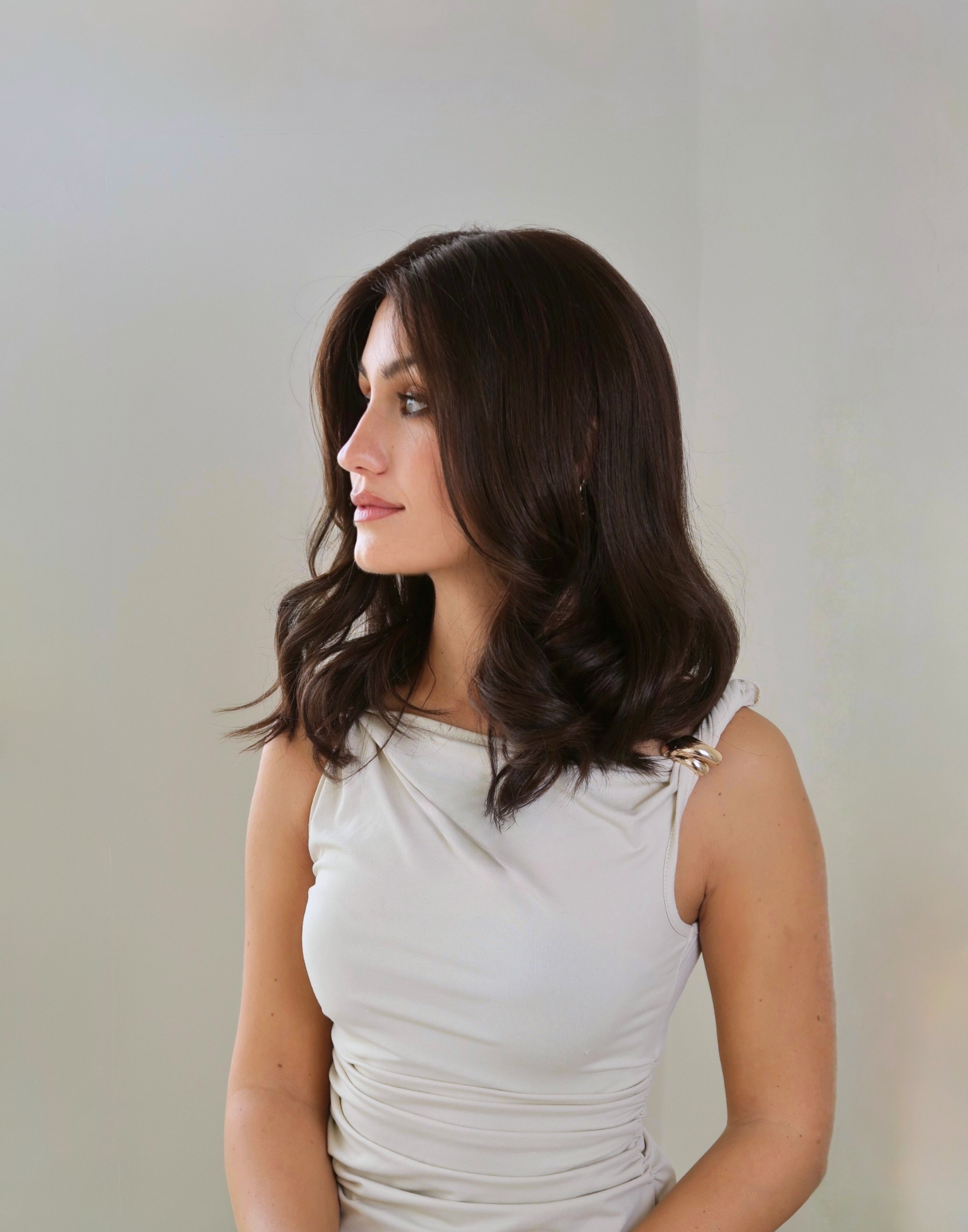 Model wearing Brunello glueless Remy human hair wig with natural movement