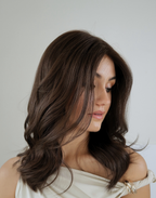 Brunello dark brown lace top wig in natural light showing subtle tonal variation
