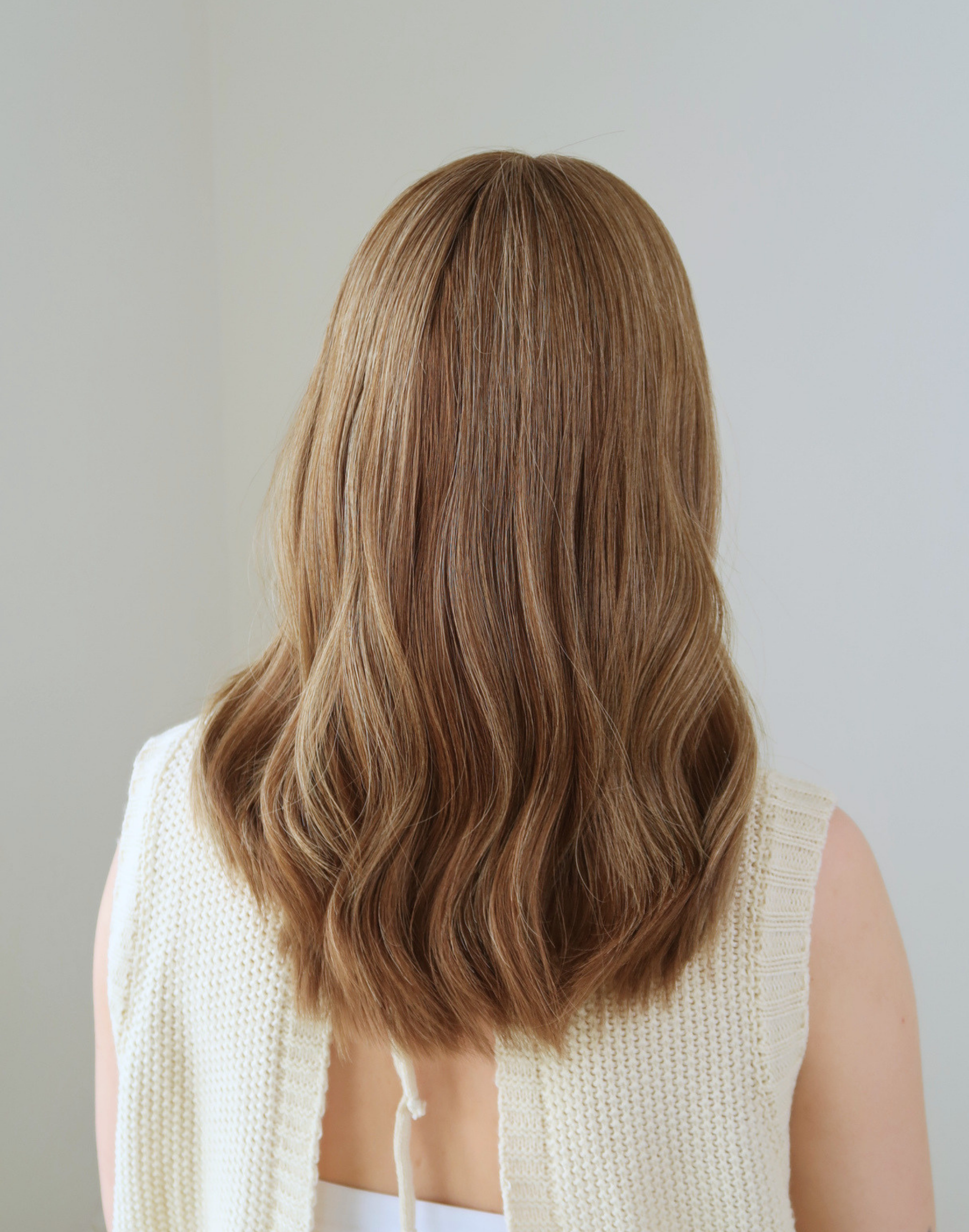 Back view of Marlowe chestnut brown wig showing dimensional color and fine golden detail