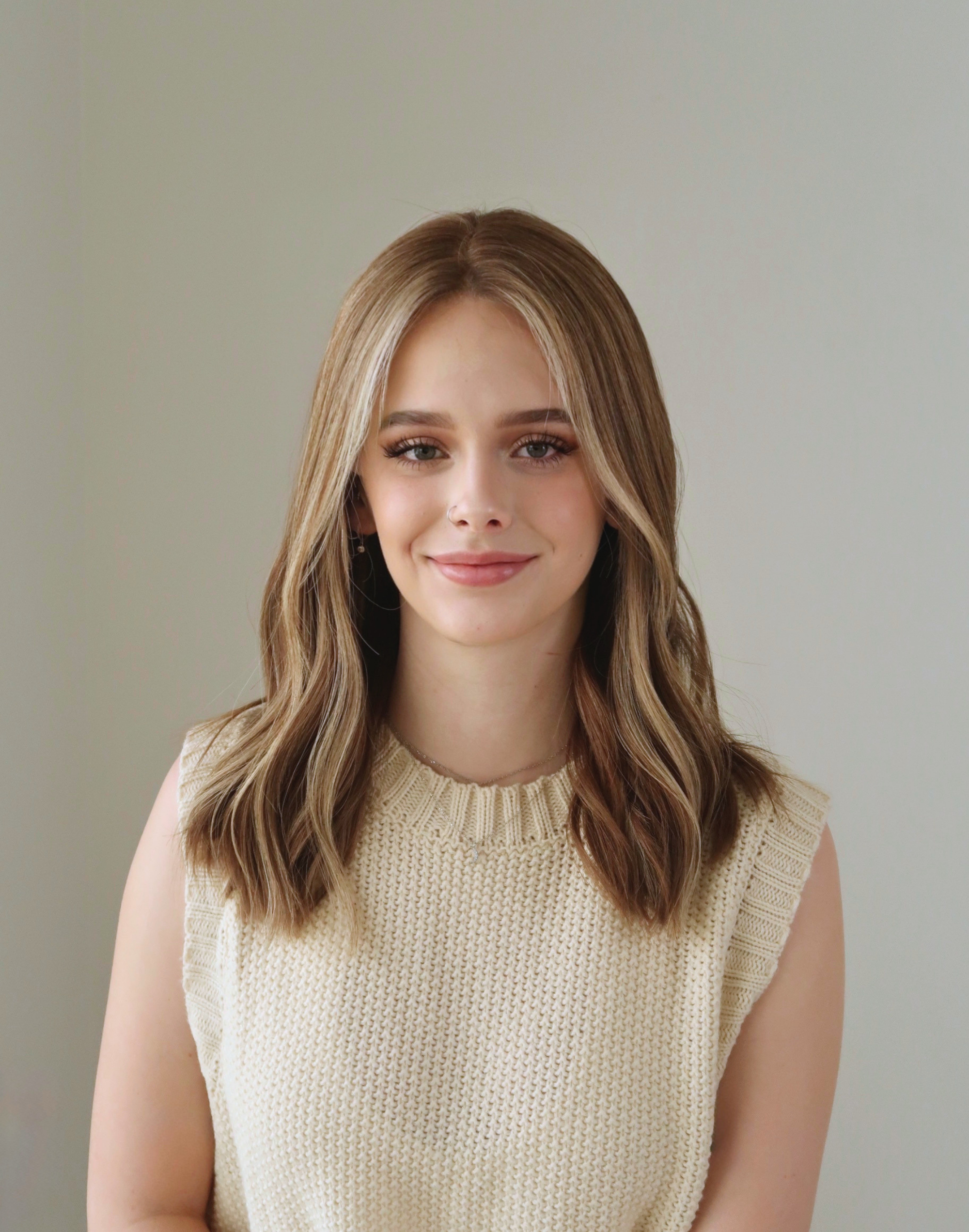 Front view of Marlowe chestnut brown Remy human hair wig with fine golden highlights