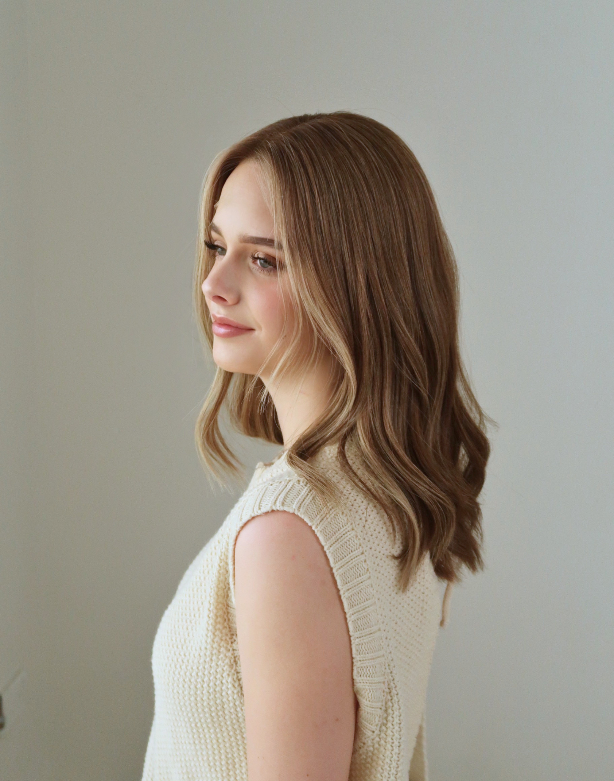 Marlowe chestnut brown lace top wig in natural daylight showing soft golden dimension