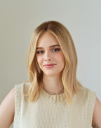 Mica beige blonde lace top wig in natural daylight showing blended beige and natural blonde tones