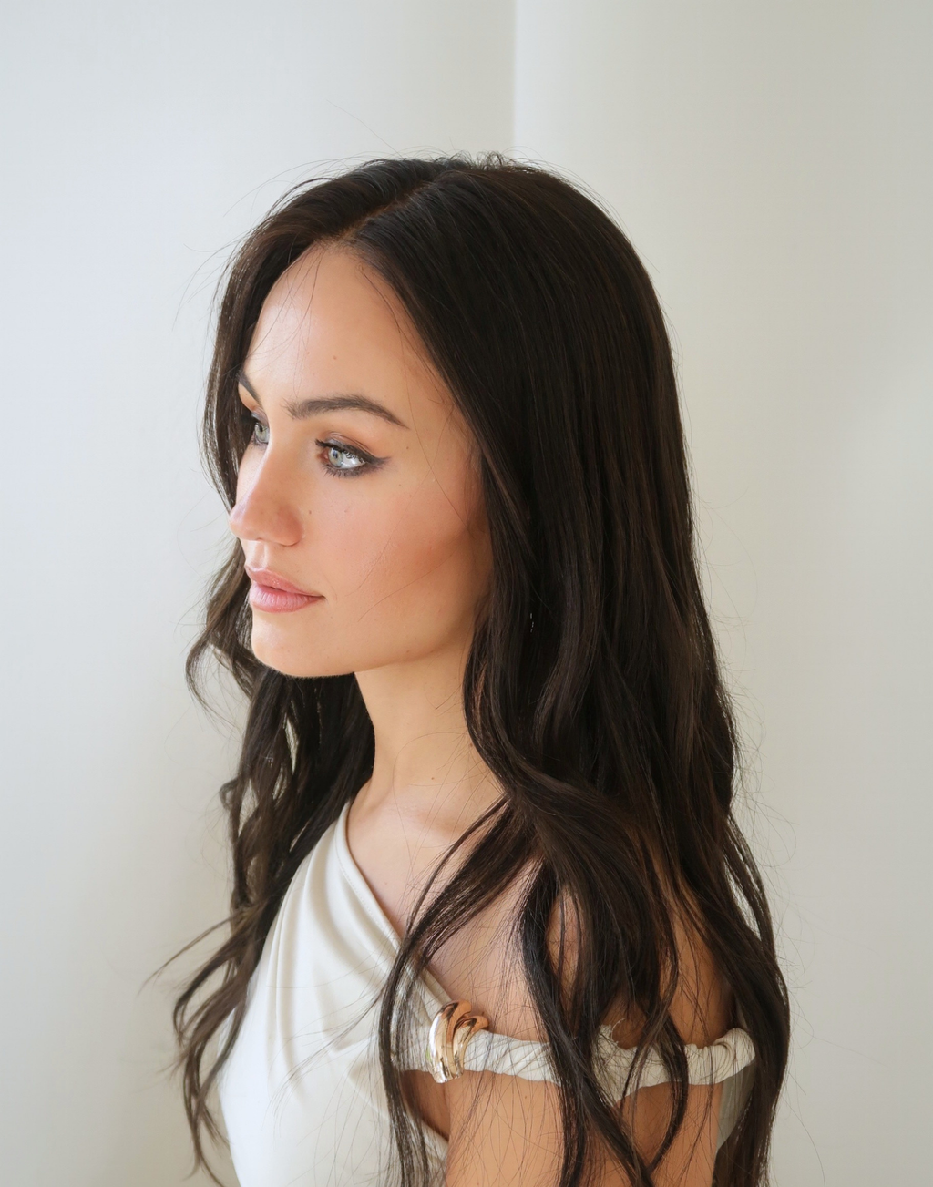 Sable natural black wig in bright daylight revealing a deep brown undertone