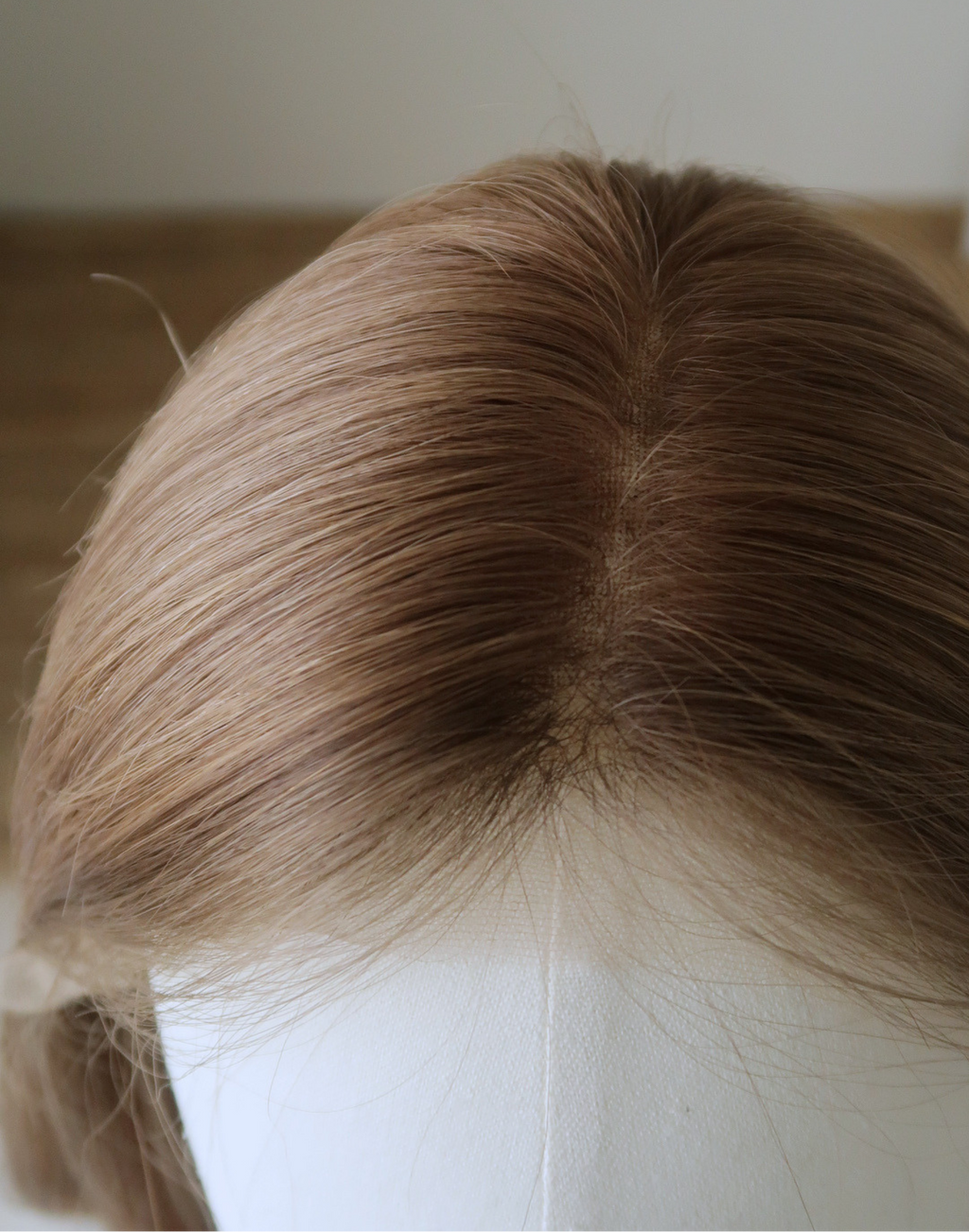 Lace top parting detail on Tawny soft brown Remy human hair wig