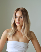 Front view of Sauternes honey blonde Remy human hair wig