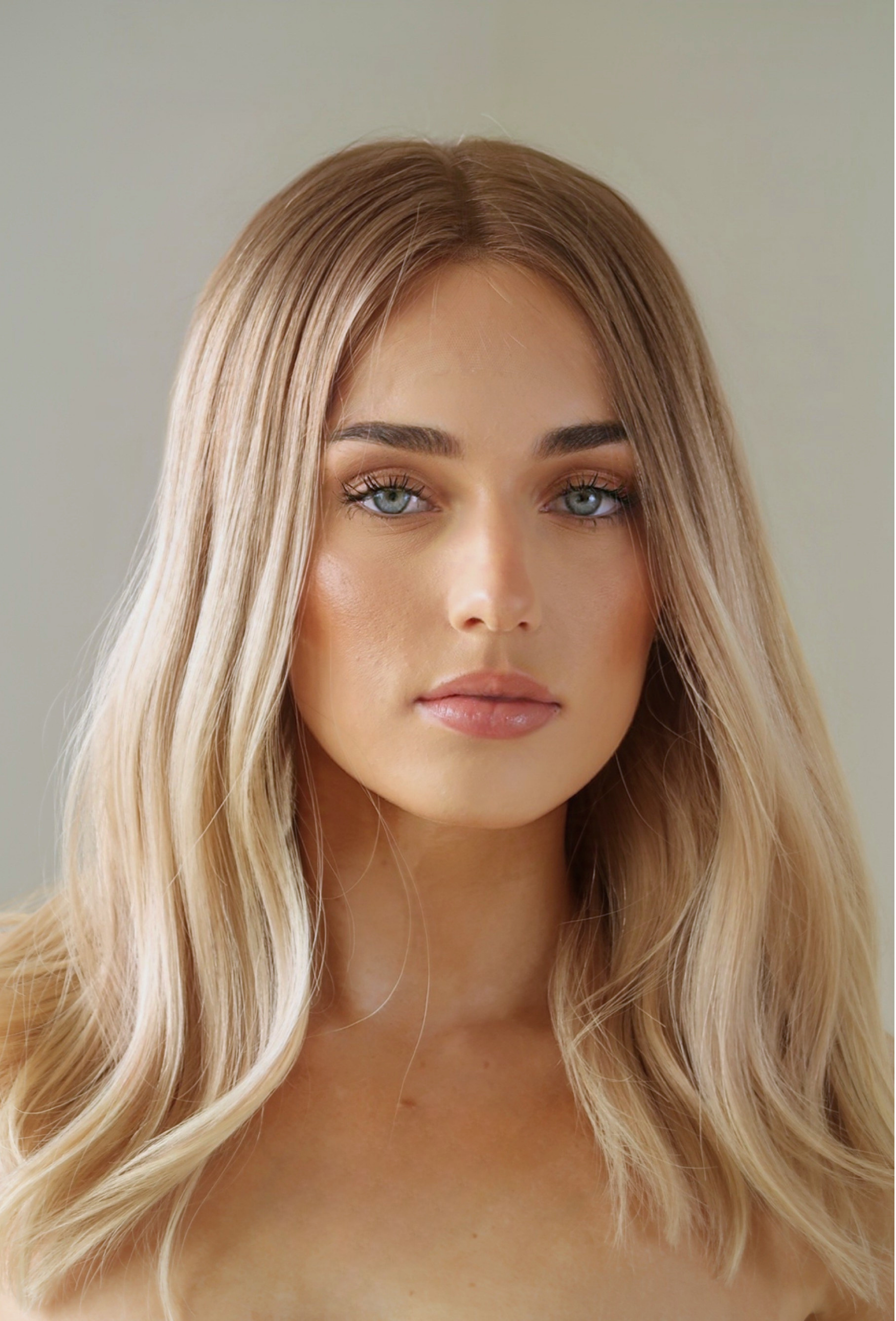 Natural hairline close-up of Sauternes honey blonde lace top human hair wig