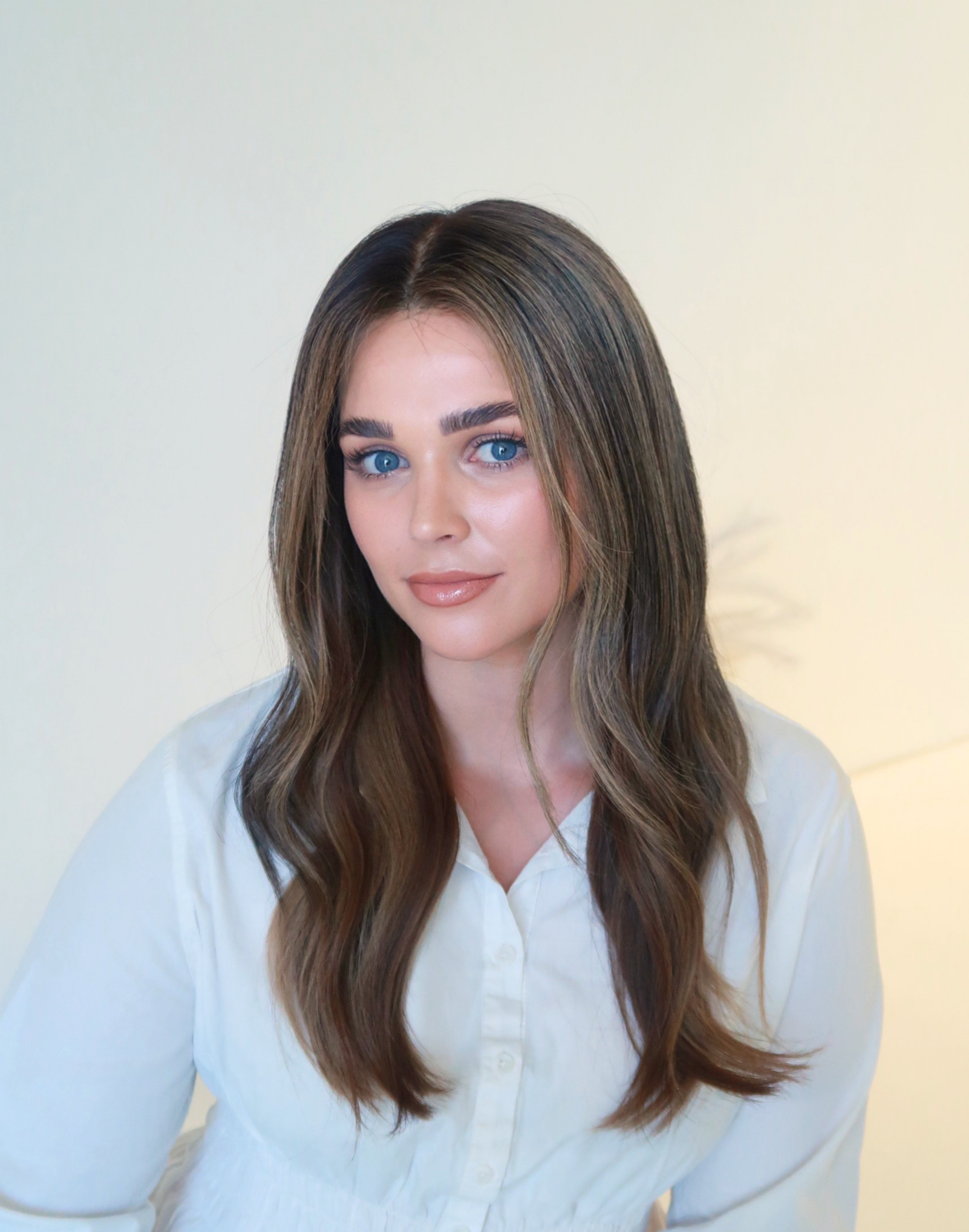 Side profile of Truffle deep brunette human hair wig with fine dimensional babylights