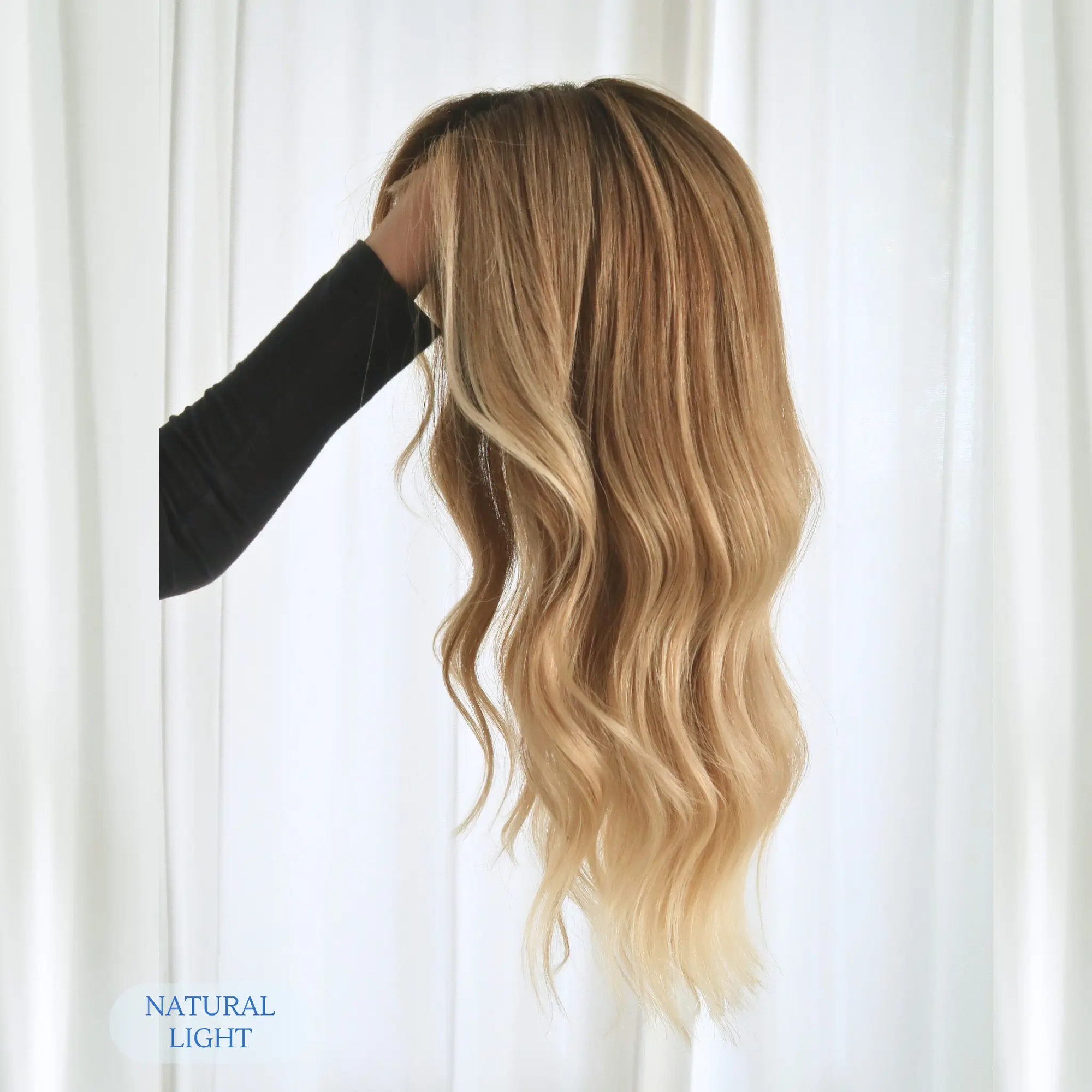 Side view of sunkissed honey blonde human hair wig, 20 inch, subtle golden highlights and face-framing layers