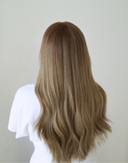 Back view of Serein human hair wig featuring muted mushroom brown with fine ash brown highlights and dimensional color throughout.
