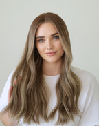 Detailed view of Serein mushroom bronde hair color, combining a muted brown base, umber roots, and delicate ash brown highlights.
