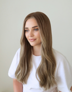 Side view of Serein mushroom brown human hair wig, showing the softly blended ash bronde tones and natural fall of the hair.